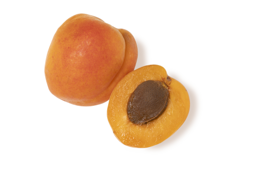 Two apricots, one whole and one halved